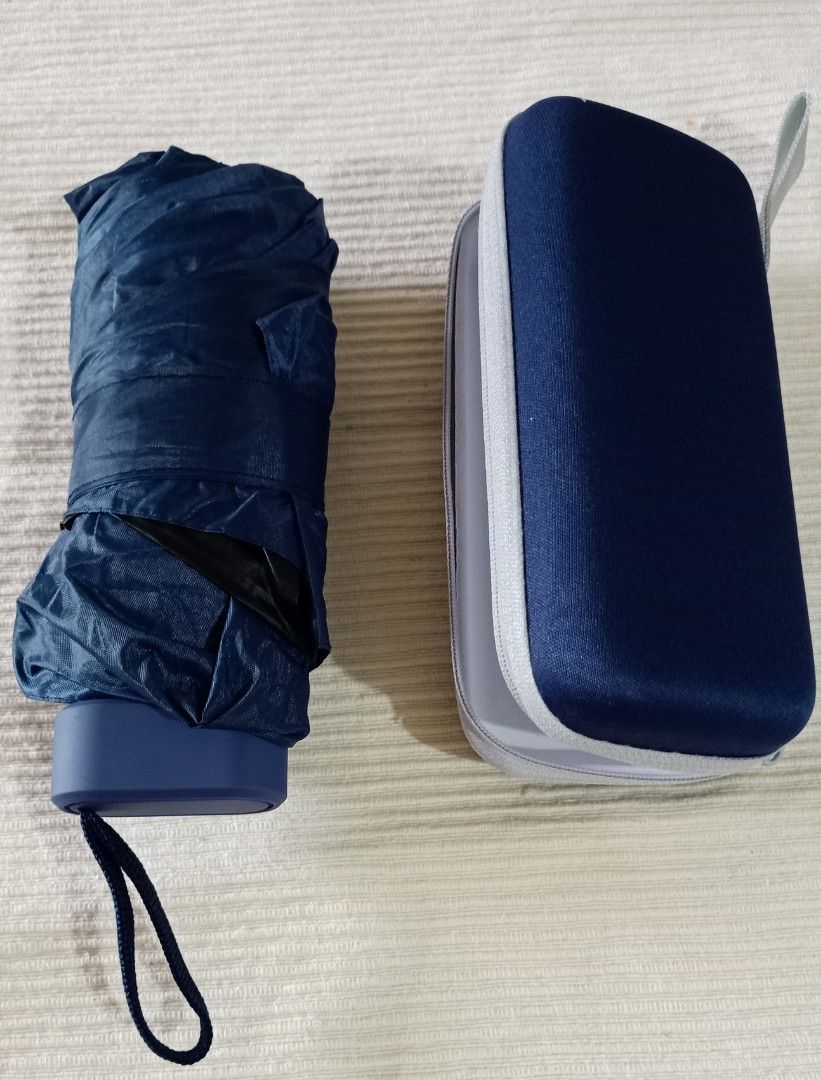 Pocketable umbrella (Category: Umbrellas) located in Caloocan City. Submitted by mr.rey08411 (Listing ID 1362172552, Image 1). Description: You can keep it inside ur pocket easily..