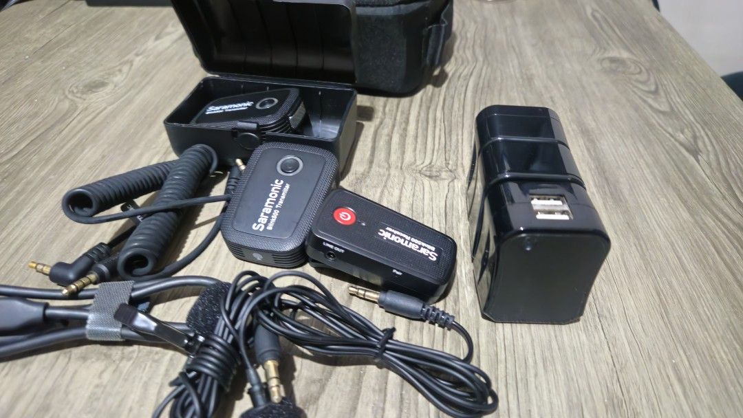 Saramonic Blink 500 Digital Wireless Mic Microphone for vlog / interview (Category: Microphones) located in Manila. Submitted by whatsup_ph (Listing ID 1362203515, Image 2). Description: Saramonic Blink 500 wireless digital mic • 2 transmitters (best for 2-person interviews) • 1 receiver • Charger port • 2 wired lavavier lapel mic (extra) • Long Range: Up to 30m (with obstacles), 50m (open area) • Compatible with DSLR, COMPACT MIRROR CAMERAS, OSM