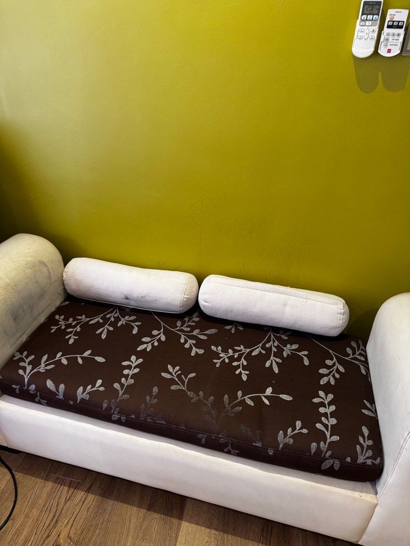 Sofas (Category: Sofas) located in Shah Alam. Submitted by lovedbychar (Listing ID 1362165024, Image 3). Description: 5 feet bench Leather / PU leather (unsure) Seating is fabric cushion. Nobody uses it at home but put things on it hence the stain. Good quality, can upholster. Comes with two small bolsters. Cream colour. Can lie down L shape for 165cm person. Self pickup in Setia Alam. .