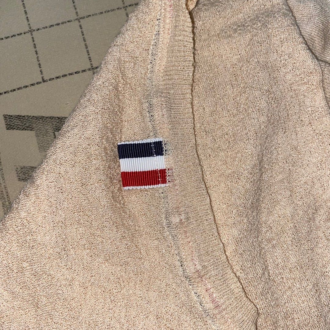 Thom Browne linen silk top (Category: Luxury Apparel) located in Santa Cruz. Submitted by jaysosmoove (Listing ID 1362221035, Image 3). Description: Thom Browne linen silk top width 17.5 length 21.5 missing main tag minimal dot stain excellent condition location • Santa Cruz, Laguna.