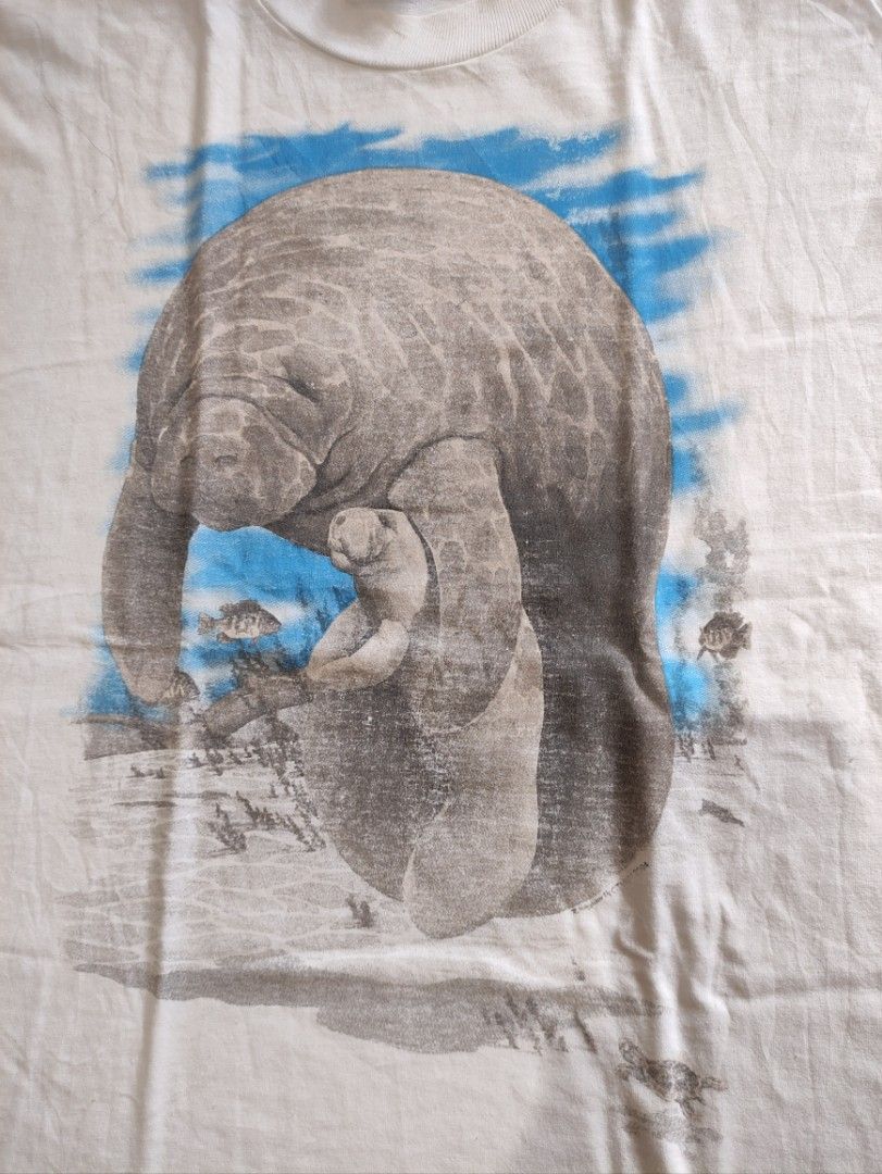 VINTAGE Manatee Shirt by Jerzees (Category: Tshirts & Polo Shirts ) located in Bacolod City. Submitted by lilhak (Listing ID 1362184127, Image 3). Description: - Size L - Issue big print kinda faded - DM to purchase - No cancellation, no bogus buyer.
