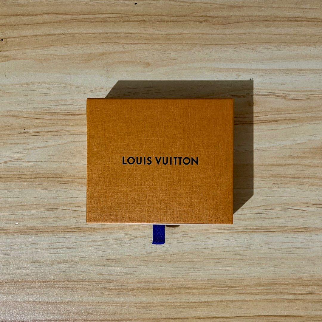 Authentic Louis Vuitton Box (Category: Luxury Bags & Wallets) located in Mandaluyong City. Submitted by kendru_03 (Listing ID 1362377770, Image 2). Description: Box Only Dimensions Width: 5.75" Depth: 5" Height: 1.5" Disclaimer: -Product color may slightly vary due to photographic lighting sources or your monitor settings. -Sizes of items listed in descriptions are approximate as measured. -The seller does not accept responsibility or liability f