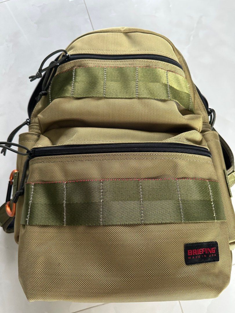 BRIEFING ATTACK PACK (Category: Backpacks) located in Singapore. Submitted by cubscoutie (Listing ID 1362308317, Image 1). Description: BRIEFING ATTACK PACK backpack BRF136219 Khaki.