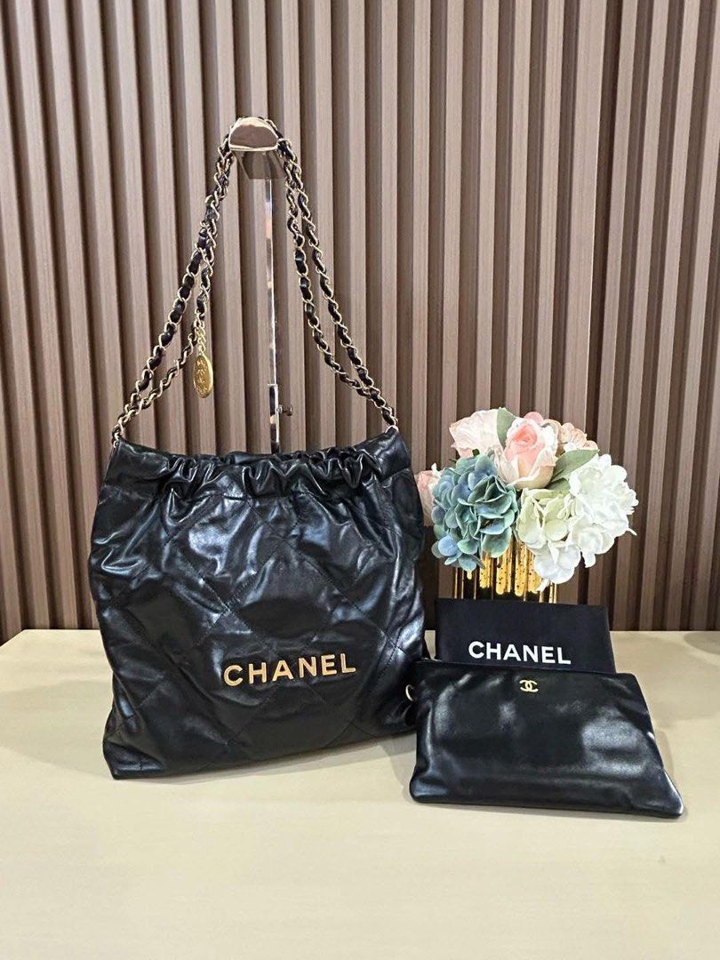 C H A N E L C22 Small Hobo Bag (Category: Luxury Bags & Wallets) located in Manila. Submitted by bagislifeshop (Listing ID 1362455442, Image 1). Description: ☑️Available in Pampanga ✅ Microchipped ✅Condition: 9.5/10 ✅Material: Shiny calf leather ✅Colour: Black in GHW ✅Size: 35 X 37 X 7CM ✅Inclusions: Dustbag and pouch .