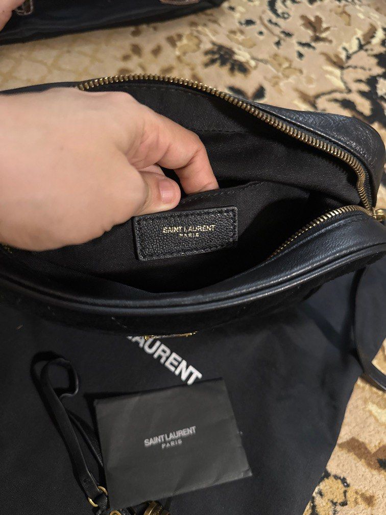 Camera Lou Bag in Suede (Category: Luxury Bags & Wallets) located in San Juan City. Submitted by angieanghelita (Listing ID 1362407258, Image 3). Description: YSL camera lou suede black shoulder bag Flaws: missing leather tassle, missing leather zipper head But very beautiful pa rin inside and out. Very spacious Ideal size for daily casual bag Zipper works very well, smooth Height 16cm Width 22 cm Depth 6cm This was a gift to me and very well use