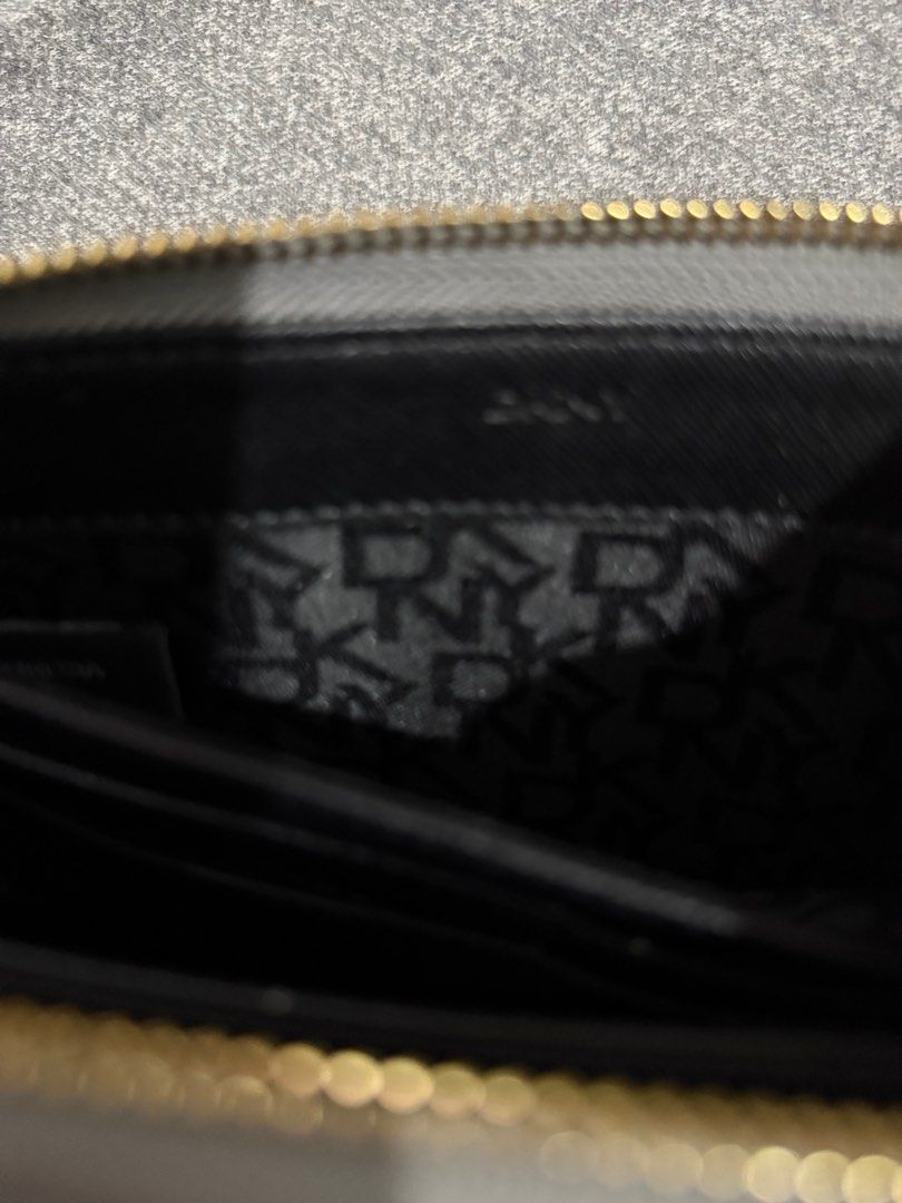 DKNY (Category: Wallets & Card holders) located in Manila. Submitted by pickstuff (Listing ID 1362438421, Image 3). Description: DKNY wallet Metallic gray .