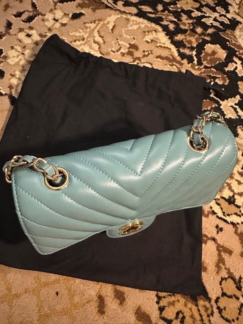 Glamorous Chevron Mini horizontal Teal (Category: Luxury Bags & Wallets) located in San Juan City. Submitted by angieanghelita (Listing ID 1362420712, Image 2). Description: Chanel classic mini rectangular flap bag (chevron design and gold hw) Perfect size. In perfect mint condition Height 13 cm Width 20cm Depth 6.5 cm This was a gift to me and used only once. I cant guarantee its authenticity because it was just given to me as a gift. But I can 