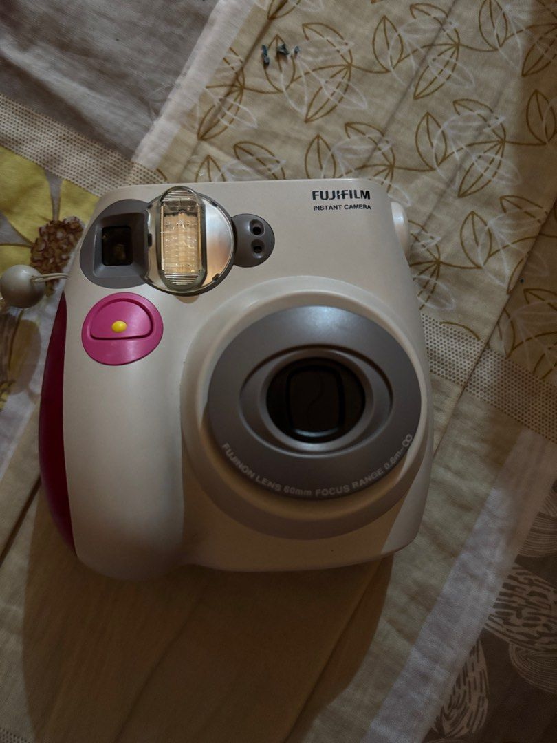 Instax mini 7s (Category: Cameras) located in Bacoor. Submitted by beeey_ (Listing ID 1362351823, Image 2). Description: Instax Mini 7s No dents or scatches Issue: Picture wont print anymore/ S on the film counter Sf: shouldered by the buyer.