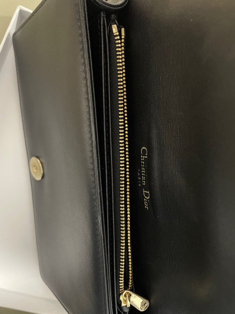 Lady Dior Pouch Black Cannage (Category: Luxury Bags & Wallets) located in Manila. Submitted by fashieclothing (Listing ID 1362431193, Image 3). Description: 💯 Authentic With card, box, dustbag • Main composition: lambskin • Lambskin and technical fabric lining • Detachable D.I.O.R. charms • One large interior compartment • One slip pocket • Two removable elements: one zipped pouch and one pouch with eight card slots and one slip pocket • Remova