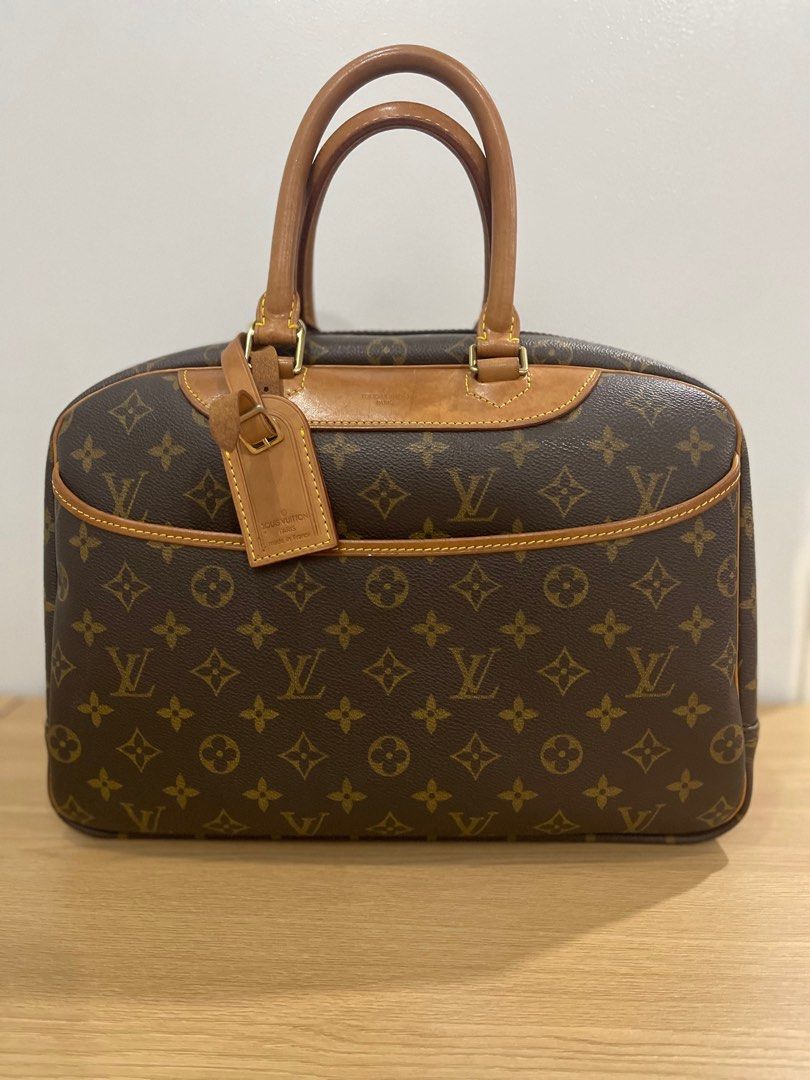 Louis Vuitton Monogram Deauville Bag (Category: Luxury Bags & Wallets) located in Makati City. Submitted by triftedandbranded (Listing ID 1362417181, Image 1). Description: Louis Vuitton Monogram Deauville Bag - Brown Slightly used with light scratches, but still in beautiful condition. Clean inside and out—classic elegance with timeless LV charm.