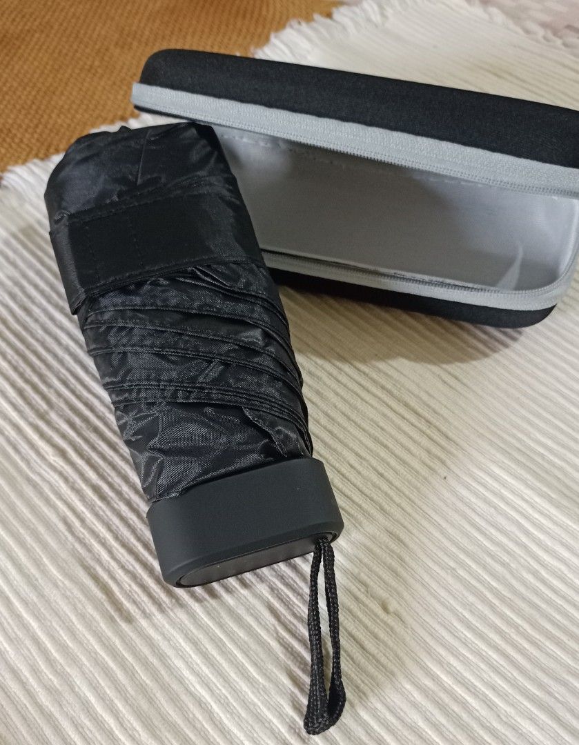 Pocketable umbrella (Category: Umbrellas) located in Caloocan City. Submitted by mr.rey08411 (Listing ID 1362336844, Image 1). Description: You can keep it inside ur pocket easily.Available colors black&blue.