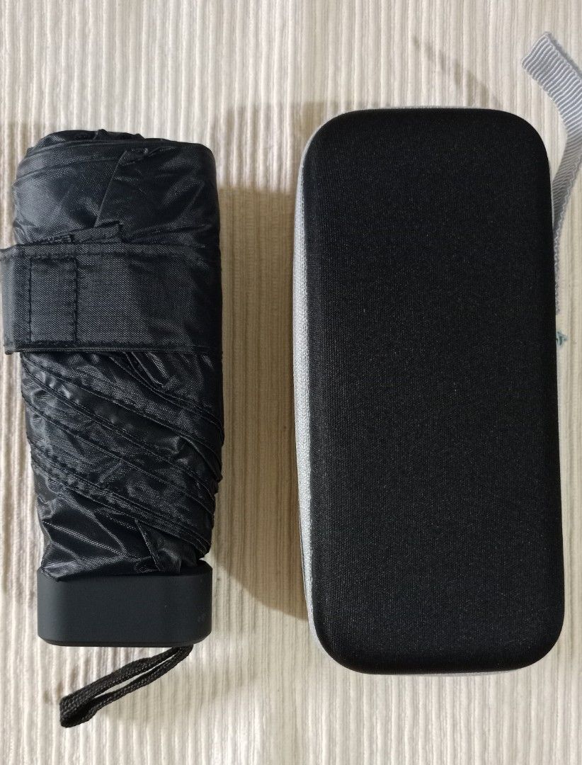 Pocketable umbrella (Category: Umbrellas) located in Caloocan City. Submitted by mr.rey08411 (Listing ID 1362336844, Image 2). Description: You can keep it inside ur pocket easily.Available colors black&blue.