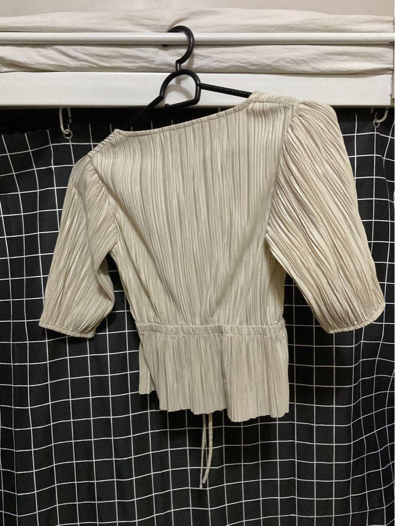 Stradivarius Beige Blouse (Category: Blouses) located in Taguig. Submitted by aerish_declutter (Listing ID 1362462108, Image 2). Description: used once looks good as new !! bought this for 600 while it was on sale (can't remember the orig price) size: medium gcash or cash (meet up) rfs: decluttering .