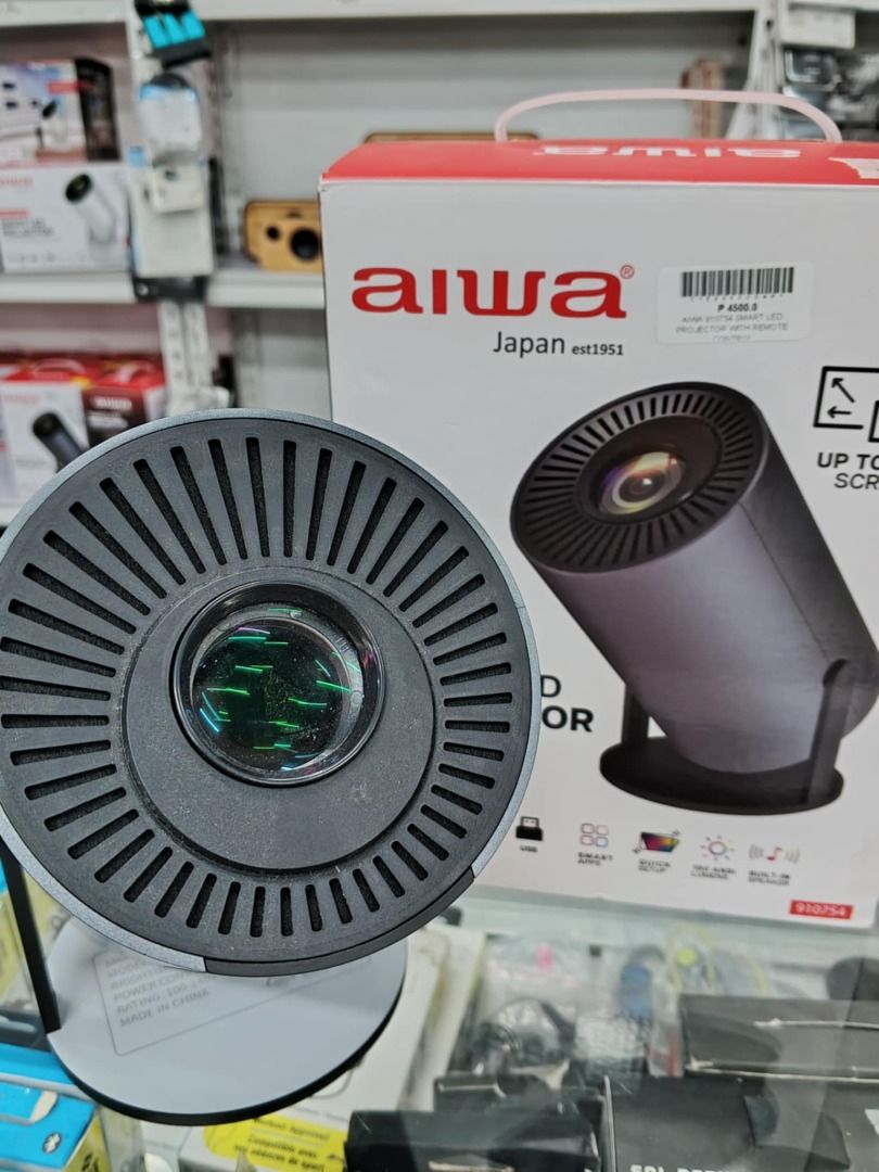 AIWA SMART LED PROJECTOR (Category: Projectors) located in Muntinlupa City. Submitted by affordable_surplus.1 (Listing ID 1362493080, Image 2). Description: AIWA SMART LED PROJECTOR PRICE: 4,500 720p HD Adjustable Tilt Up To 210 USB Smart Apps Quick Set Up 150 Ansi Lumens W/ Built In Speakers Contact:Reine-09611741423.