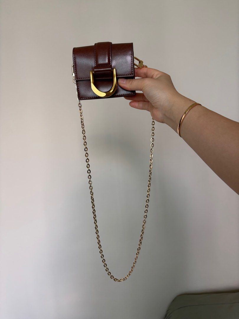 Charles & Keith mini bag (Category: Purses & Pouches) located in Singapore. Submitted by zhnroyn60774 (Listing ID 1362498929, Image 1). Description: Brand new no box Letting go for cheap so no nego AUTHENTIC Pick up only Tanjong Pagar/Clementi MRT.