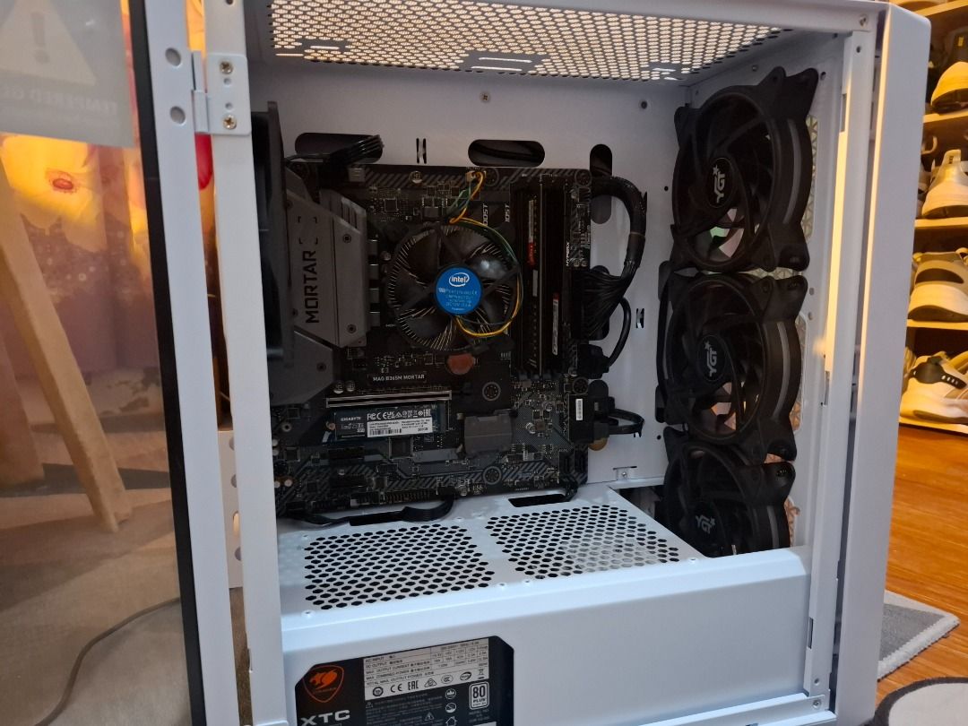 Desktop Computer (Category: Desktops) located in Quezon City. Submitted by manalangharvey07 (Listing ID 1362483108, Image 3). Description: Selling my desktop computer. Newly serviced and recased. Specifications: Processor: Intel i5-9400 Motherboard: MSI MAG B365M Mortar Power Supply: Cougar 550W True Rated PSU Storage: Gigabyte 500GB M.2 SSD WD 320GB HDD WD 500GB HDD (x2) Memory: 24GB RAM Includes: 24-inch Samsung monitor RK68 mechanical keyboard