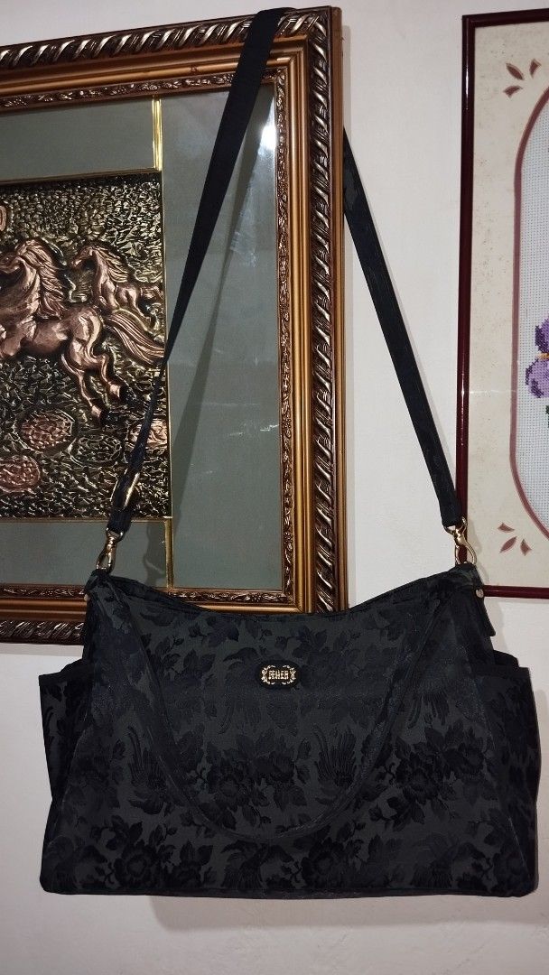 Feiler Embroidered Nylon Two Way Mommy Bag (Category: Cross-body Bags) located in Taguig. Submitted by bellecabano (Listing ID 1362643313, Image 1). Description: This is a unique feiler Embroidered Nylon Two way Bag can be worn as shoulder bag or sling bag ( adjustable ) nothing to declare, pwede po sya mommy bag Kasi marami sya side pocket and even sa loob marami din po sya side pockets the hardwares is still gold no rips and tears, no runs, no 