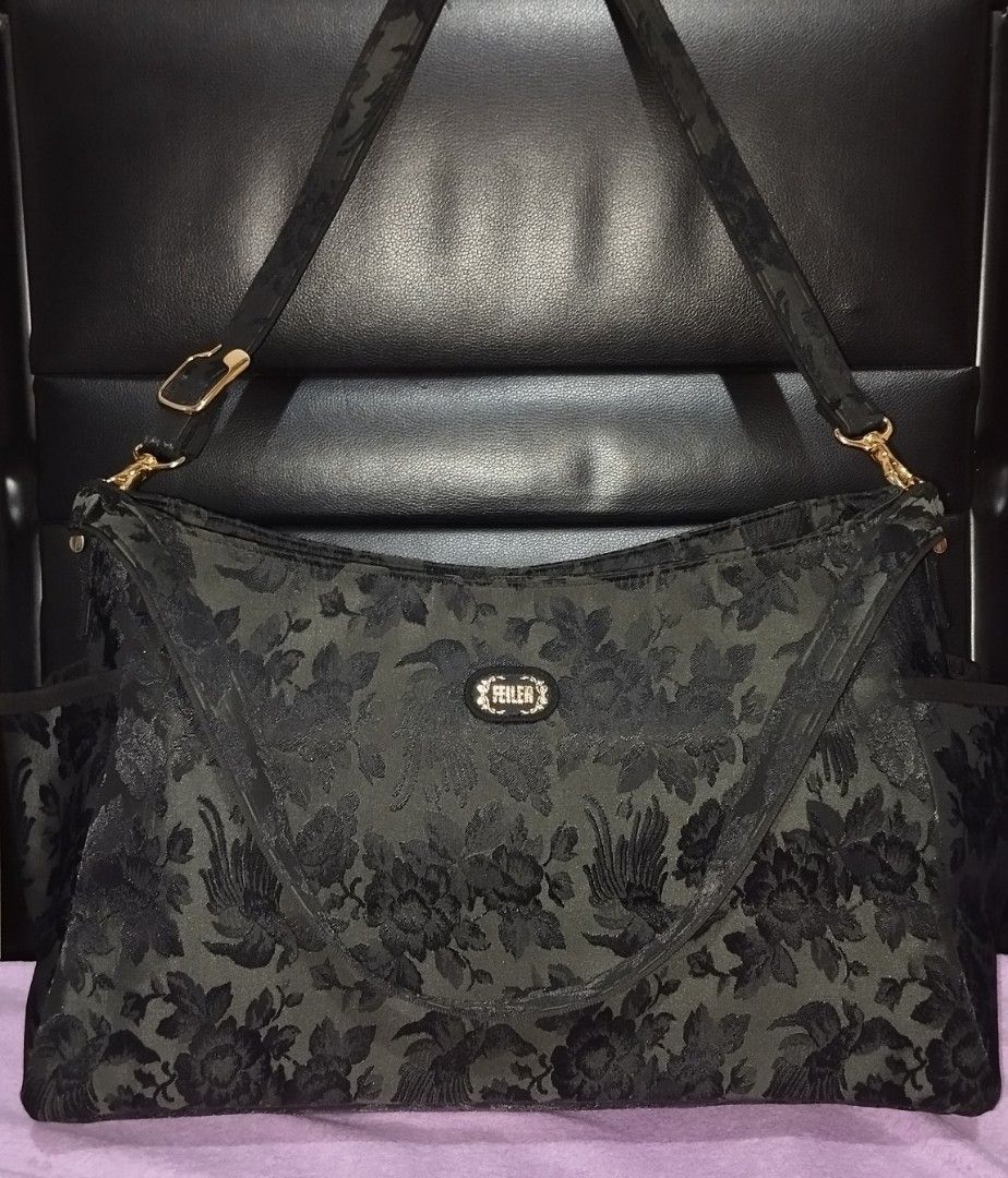 Feiler Embroidered Nylon Two Way Mommy Bag (Category: Cross-body Bags) located in Taguig. Submitted by bellecabano (Listing ID 1362643313, Image 2). Description: This is a unique feiler Embroidered Nylon Two way Bag can be worn as shoulder bag or sling bag ( adjustable ) nothing to declare, pwede po sya mommy bag Kasi marami sya side pocket and even sa loob marami din po sya side pockets the hardwares is still gold no rips and tears, no runs, no 