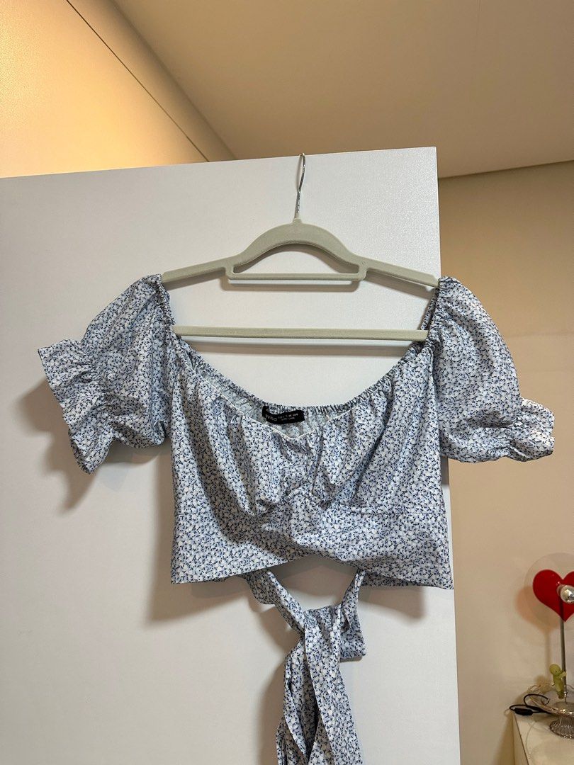 Lovito Blue floral off-shoulder top (Category: Blouses) located in Manila. Submitted by shopcoy (Listing ID 1362529246, Image 1). Description: Item: Blue floral off-shoulder top Price: Php 200 Brand: Lovito Size: Large Details: • Pre-loved but in good condition • Off-shoulder type • Ribbon tie at the back • Garter at the back is a bit loose for my size so I had to tuck the loose fabric to my bra (see photo for reference).