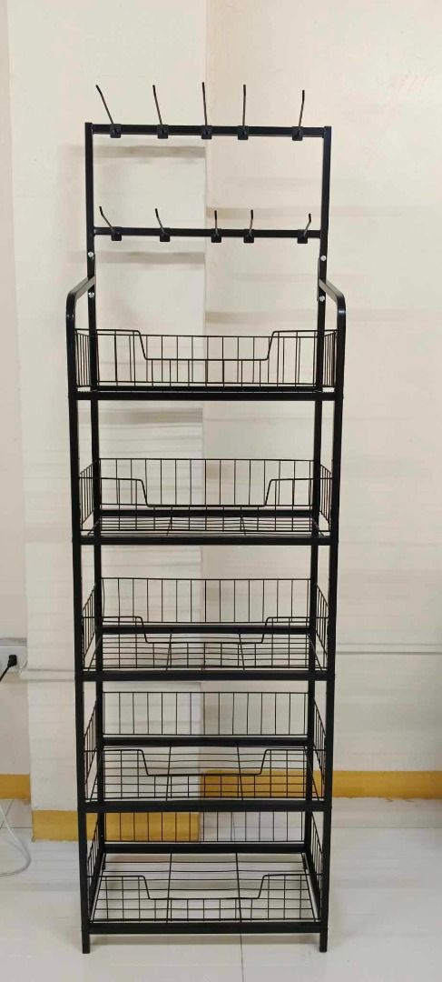 Multipurpose 5 LAYERS ORGANIZER SHELF (Category: Storage Boxes & Baskets) located in Quezon City. Submitted by zttrendshoppe (Listing ID 1362550142, Image 2). Description: Organizer shelf for supermarket, convenience store or kitchen pantry. Can be also organizer for school and office supplies. MATERIAL: Steel frame for heavy duty ACTUAL SIZE: 60*27*146 cm PACKAGING SIZE: 155*32*9 cm VOLUMETRIC WEIGHT: 6 KG 2 COLORS AVAILABLE: White and black.