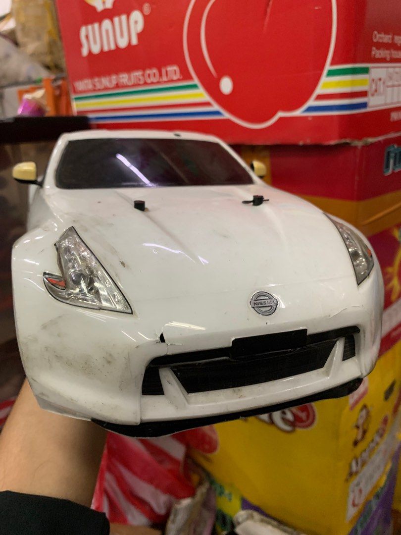 nissaan fairlady rc car (Category: Remote Control Toys) located in Manila. Submitted by reccario1603354 (Listing ID 1362570900, Image 2). Description: nissan fairlady remote control car japan surplus as is condition.