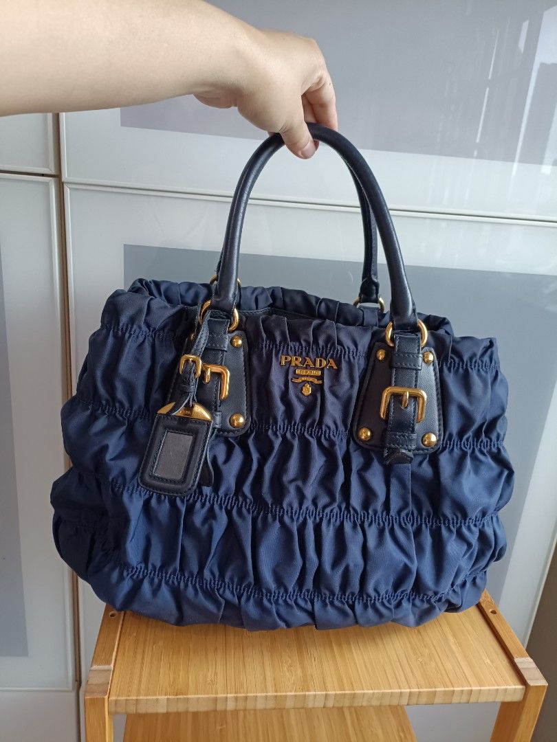 prada bag authetic tessuto Gaufre (Category: Bags & Wallets) located in Singapore. Submitted by estherdelt37853 (Listing ID 1362499455, Image 1). Description: authetic prada bag in beautiful midnight navy color limited color edition roommy and light weight with nylon fabric good for travelling and work has original receipt authentic authentic just come back from a bag spa.