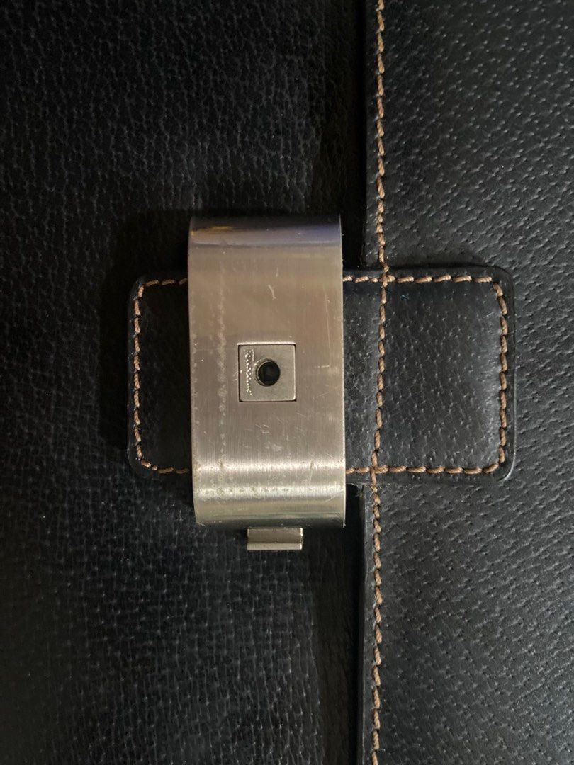 Salvatory Ferragamo Wrsit/Clutch Bag (Category: Luxury Bags & Wallets) located in Pili. Submitted by rgthriftflip29 (Listing ID 1362504132, Image 2). Description: S. FERRAGAMO See pics for details Working lock with Key ❗️ .