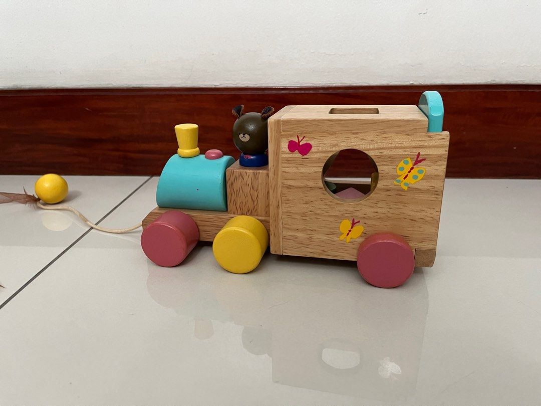 The bears school wooden train shape sorter (Category: Infant Playtime) located in Quezon City. Submitted by muffet9 (Listing ID 1362579388, Image 3). Description: Made of sturdy non toxic wood Item is relatively heavy Like new Includes shape sorter with 3 shapes Pull toy.