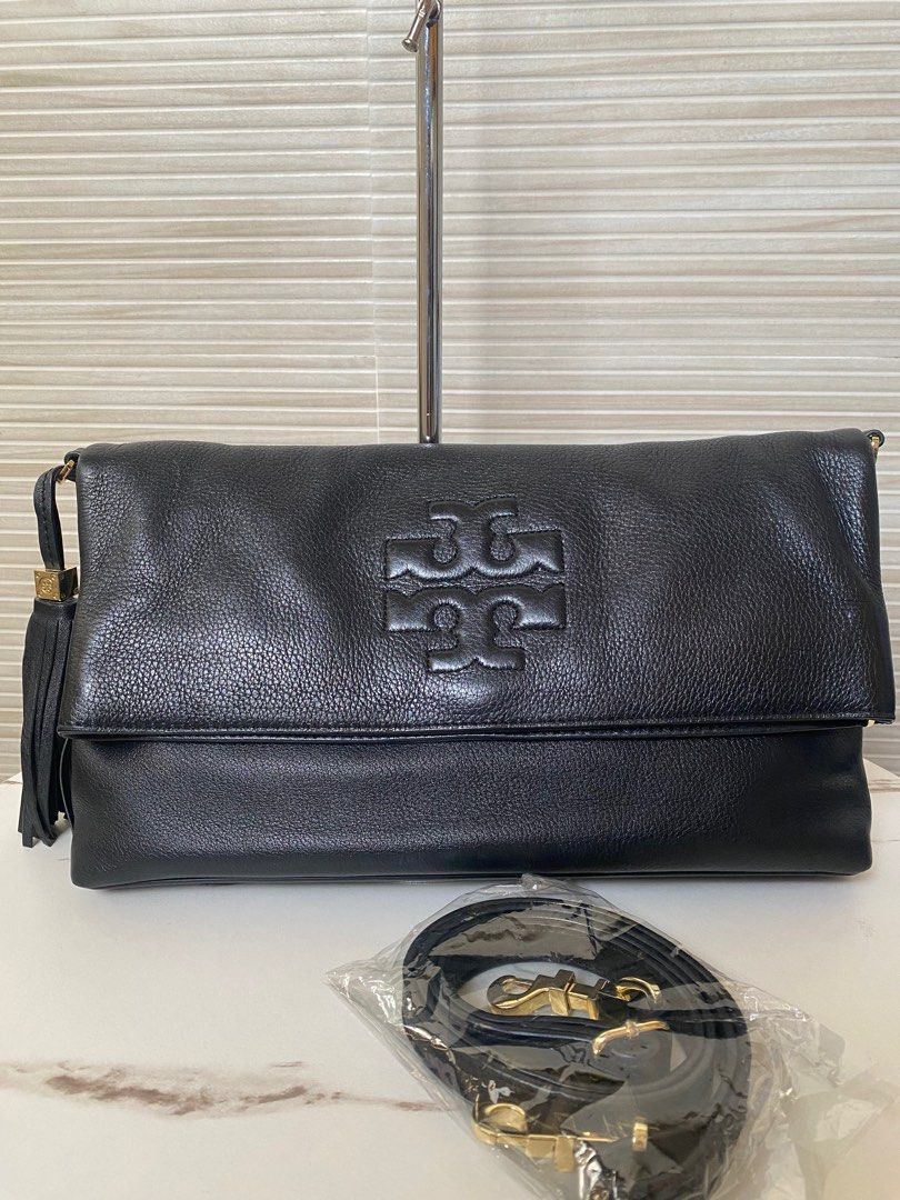 Tory Burch Thea Foldover Crossbody Bag (Category: Luxury Bags & Wallets) located in Binan City. Submitted by ellie.ville (Listing ID 1362509841, Image 1). Description: All items posted here are legit, authentic, original or whatever you may call it, they’re my personal items usually bought personally, gifts, pasalubongs, and there are few hand-me-down from my Ates. Kindly avoid inquiries about legitimacy if you are doubtful with the item. — Nothi