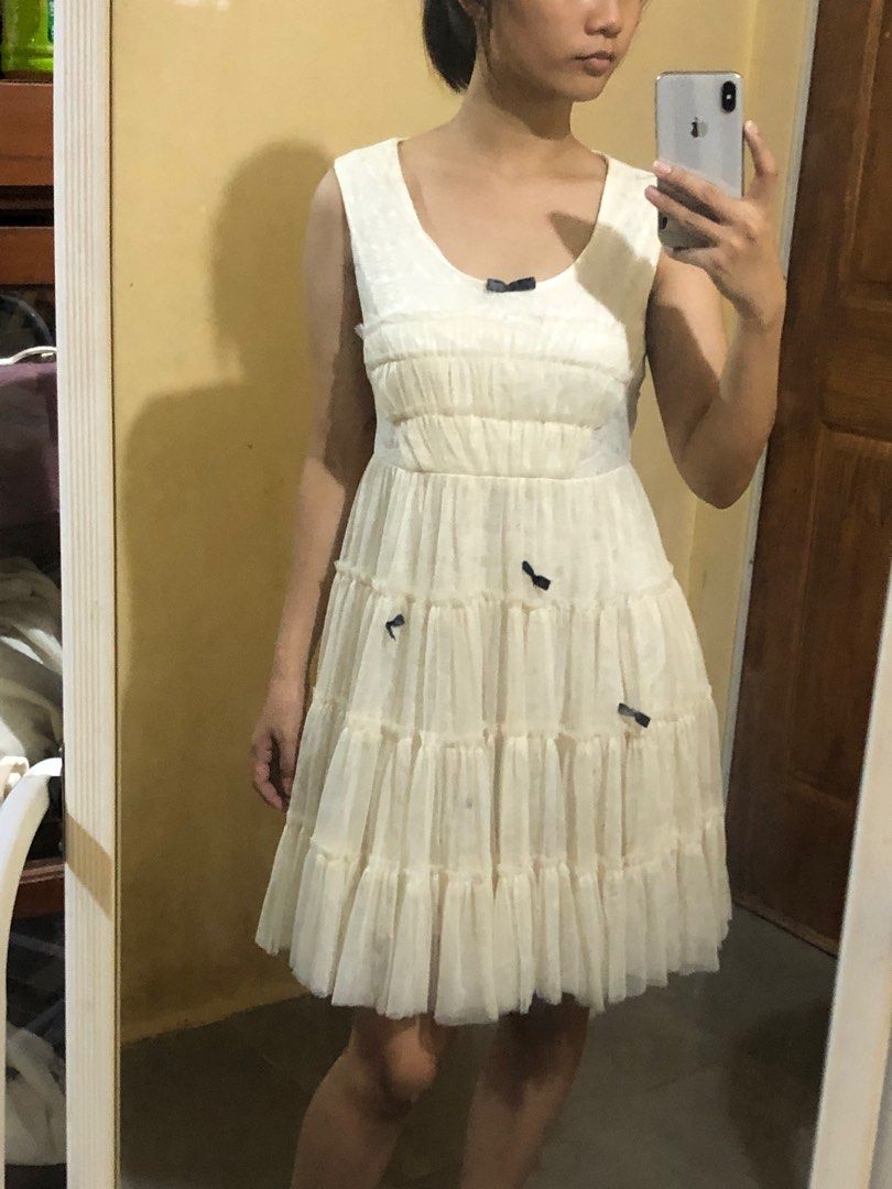 White soft mesh coquette mini dress (Category: Dresses) located in Tarlac. Submitted by clpari (Listing ID 1362634844, Image 1). Description: White soft mesh coquette mini dress fixed yung ribbon, ganyan na nung nabili ko makapal ito, better if may petticoat or bloomers sa inner B: 30-36” W: 26-28” L: 32” M: 120.