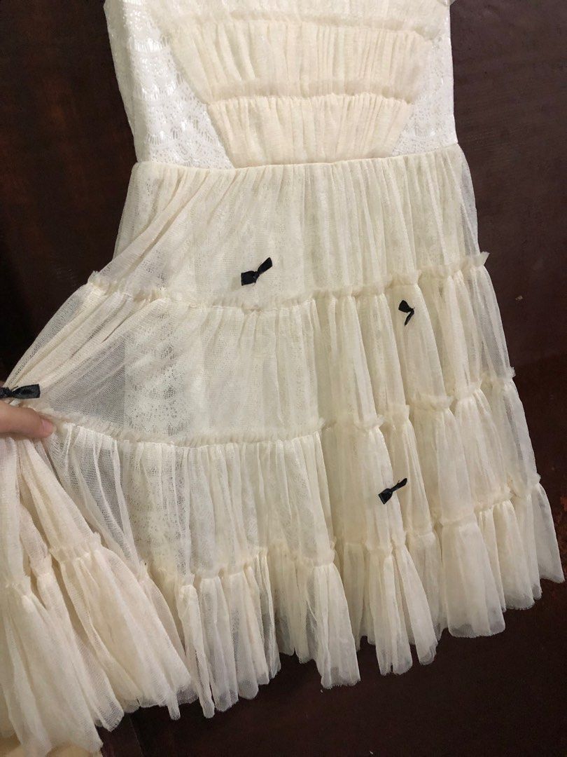 White soft mesh coquette mini dress (Category: Dresses) located in Tarlac. Submitted by clpari (Listing ID 1362634844, Image 3). Description: White soft mesh coquette mini dress fixed yung ribbon, ganyan na nung nabili ko makapal ito, better if may petticoat or bloomers sa inner B: 30-36” W: 26-28” L: 32” M: 120.