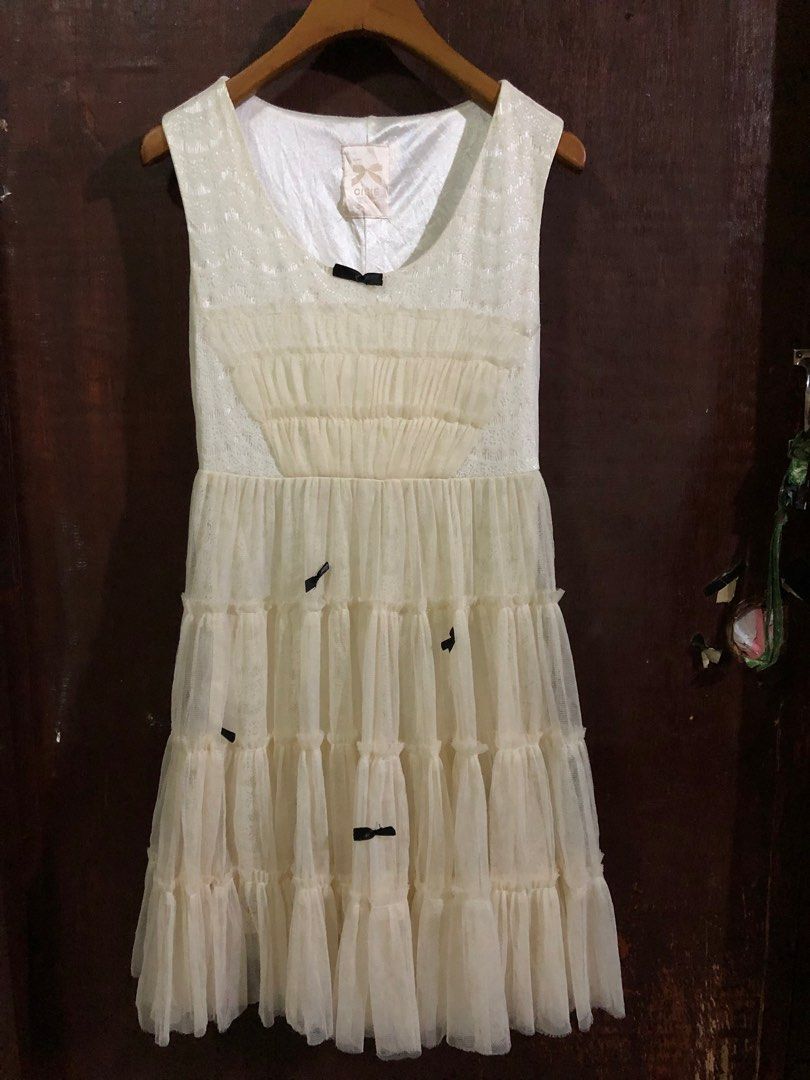 White soft mesh coquette mini dress (Category: Dresses) located in Tarlac. Submitted by clpari (Listing ID 1362634844, Image 2). Description: White soft mesh coquette mini dress fixed yung ribbon, ganyan na nung nabili ko makapal ito, better if may petticoat or bloomers sa inner B: 30-36” W: 26-28” L: 32” M: 120.