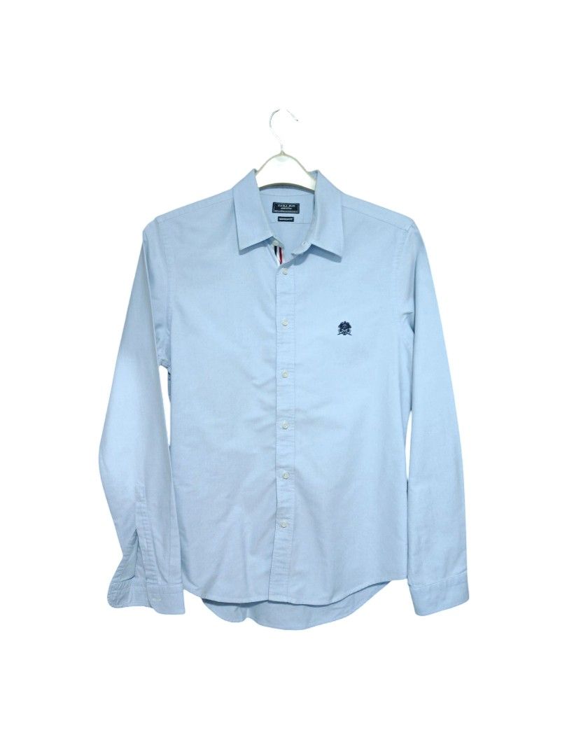 Zara Long Sleeves Polo (Category: Formal Shirts) located in Makati City. Submitted by inxsstuff (Listing ID 1362531312, Image 2). Description: Denim texture With piped button placket Medium Superslim Fit Good condition Payment via Gcash or BPI transfer.