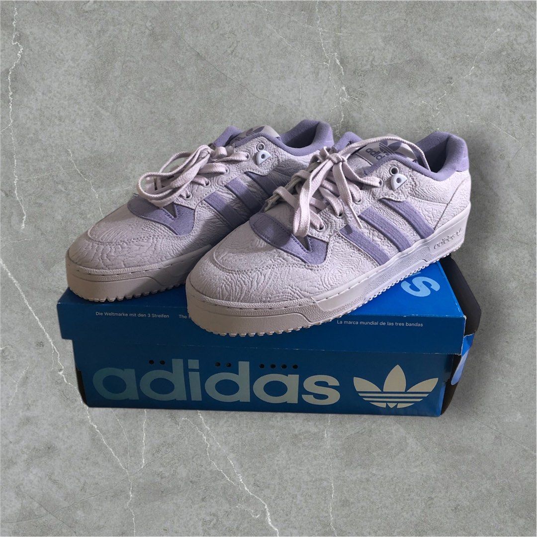 adidas rivalry low purple (Category: Sneakers) located in Caloocan City. Submitted by theeclutter (Listing ID 1362745697, Image 1). Description: adidas rivalry low purple size 11 bnew 2,500 (below srp of 5,000).