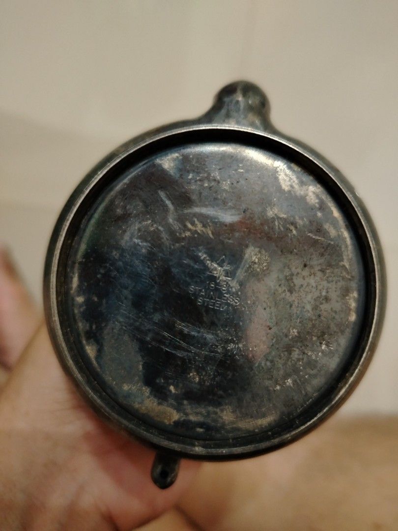 antique silver teapot (Category: Coffee & Tea Tableware) located in Parang, Maguindanao. Submitted by lawon_koleksyon (Listing ID 1362794248, Image 2). Description: The image shows the bottom of an antique silver teapot, likely from the 19th century. Here's some information about it: The marking "18-8 Stainless Steel" indicates the material composition. Helpful Information: Material: 18-8 stainless steel is a durable, corrosion-resistant alloy co