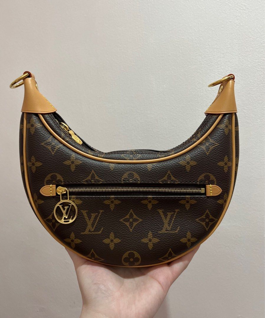 Authentic Louis Vuitton LV Monogram Half Moon Baguette Loop PM Bag (Category: Luxury Bags & Wallets) located in Makati City. Submitted by cindiorella (Listing ID 1362812223, Image 2). Description: 100% guaranteed authentic In very good condition (9.3/10) Comes with long vachetta strap, material card & dust bag only (no gold chain strap).