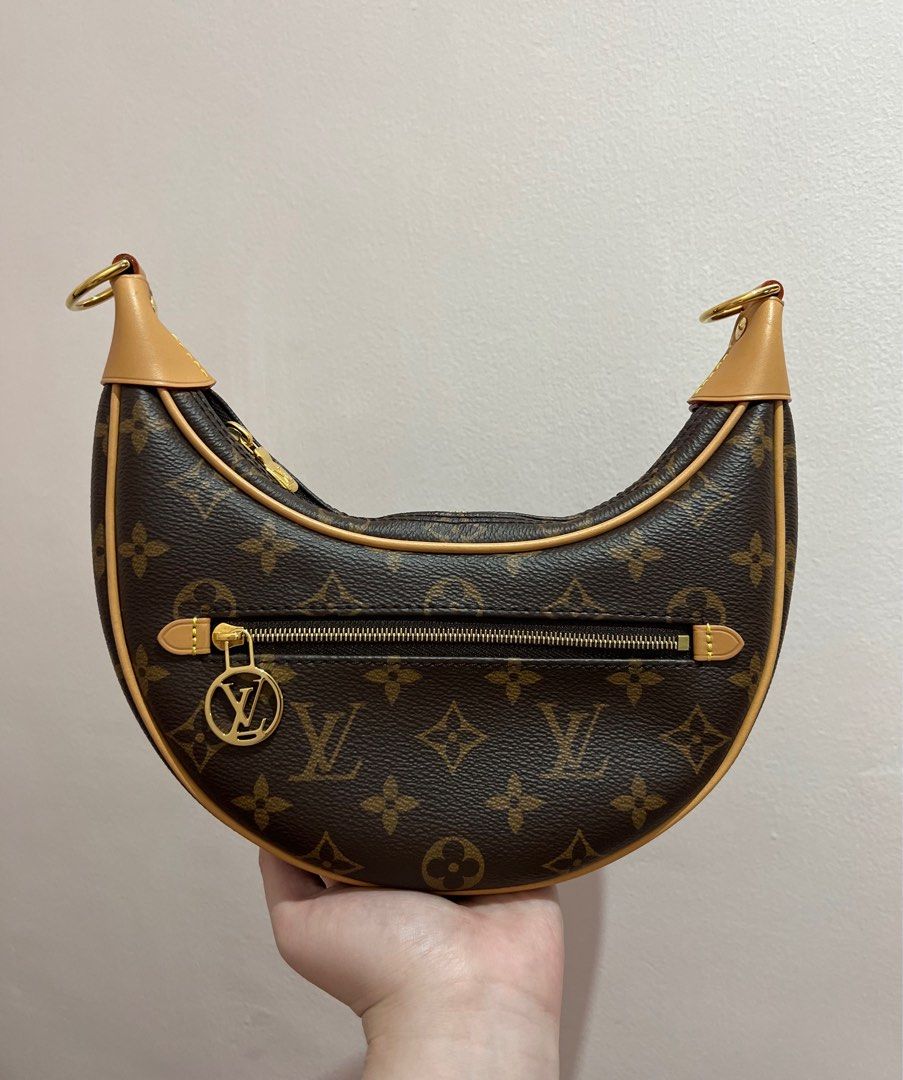 Authentic Louis Vuitton LV Monogram Half Moon Baguette Loop PM Bag (Category: Luxury Bags & Wallets) located in Makati City. Submitted by cindiorella (Listing ID 1362812223, Image 1). Description: 100% guaranteed authentic In very good condition (9.3/10) Comes with long vachetta strap, material card & dust bag only (no gold chain strap).