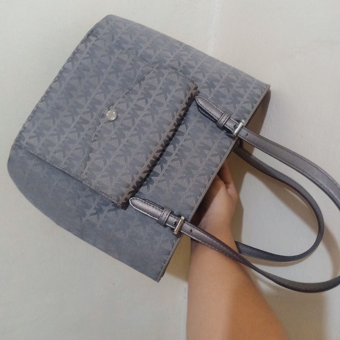 Authentic MK Gray Tote Bag (w/ care cards & QR code)) (Category: Luxury Bags & Wallets) located in Quezon City. Submitted by mari_x (Listing ID 1362753611, Image 3). Description: Legit MK Tote Bag with Care Cards & QR code From US Personal Bag Good as new Clean inside & out No flaws.