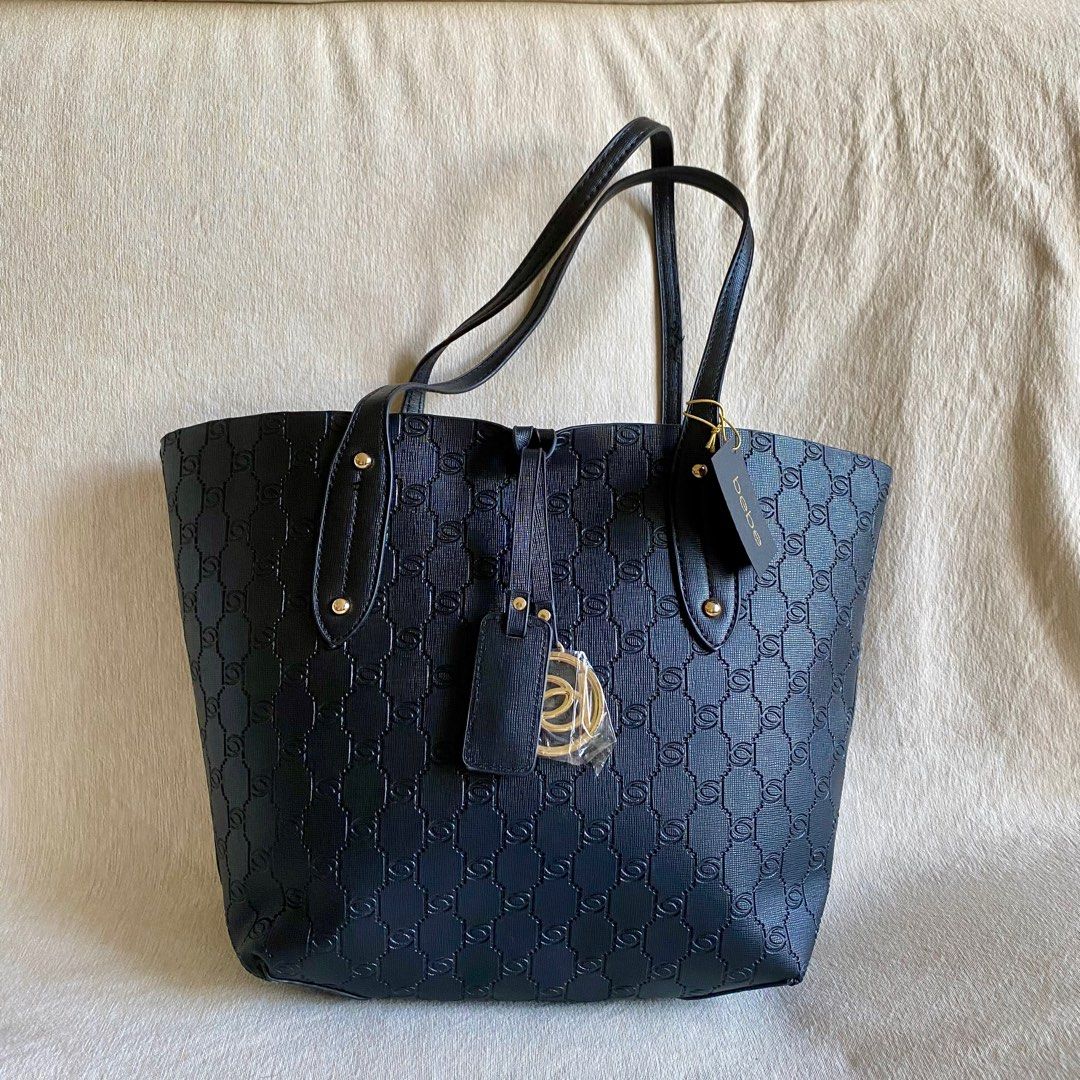 Bebe Black Tote Bag (Category: Luxury Bags & Wallets) located in Quezon City. Submitted by nikknacks (Listing ID 1362656410, Image 1). Description: Bebe Black Tote Bag ✅Brand new ✅💯original ✅RFS: Decluttering 💰Original price is USD 99 (around Php 5,700) and selling for only Php 2,900 📩PM if interested .