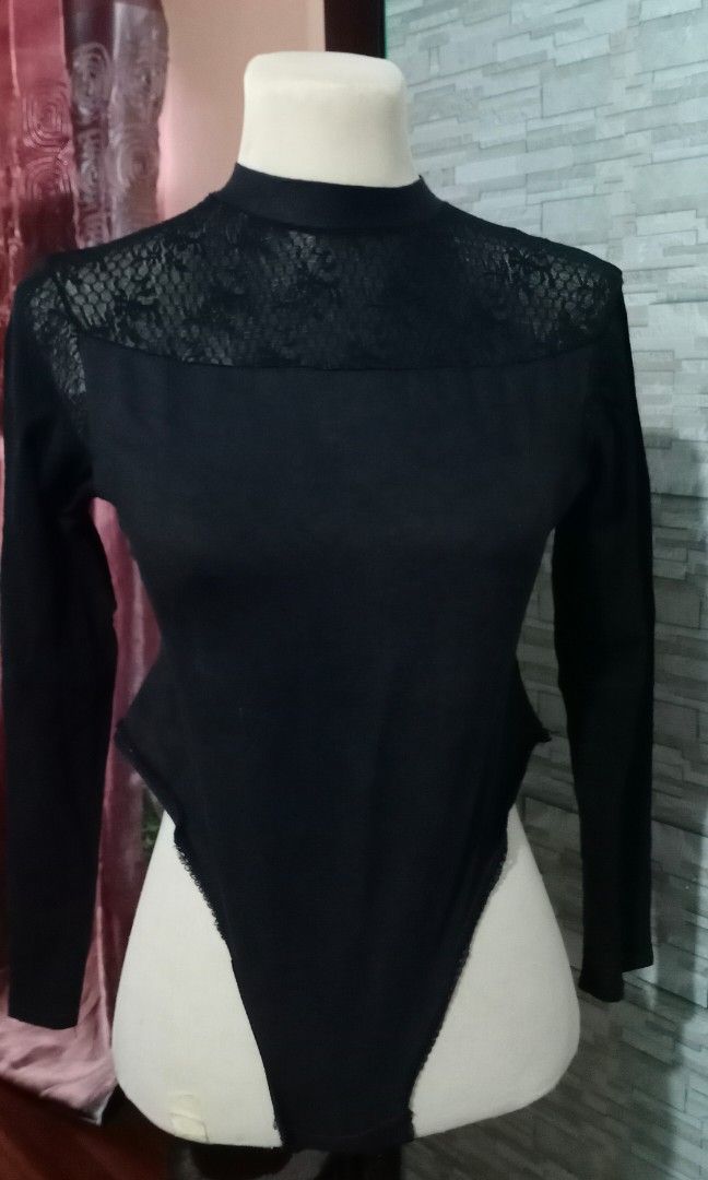 Black sexy Lace Bodysuit (Category: Longsleeves) located in Makati City. Submitted by decluttering_stuff101 (Listing ID 1362755150, Image 1). Description: stretchable.
