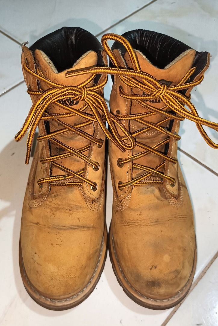 BUFFALO 6 holes leather boots (Category: Boots) located in Santo Tomas. Submitted by pickers_corner (Listing ID 1362686927, Image 2). Description: BUFFALO 6 holes leather boots size 230 or 6.5US very good condition issue minor heel drag and scratches .
