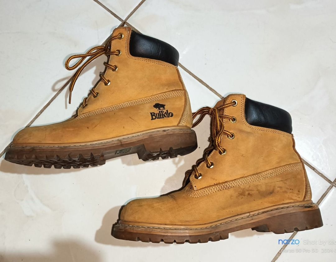BUFFALO 6 holes leather boots (Category: Boots) located in Santo Tomas. Submitted by pickers_corner (Listing ID 1362686927, Image 3). Description: BUFFALO 6 holes leather boots size 230 or 6.5US very good condition issue minor heel drag and scratches .