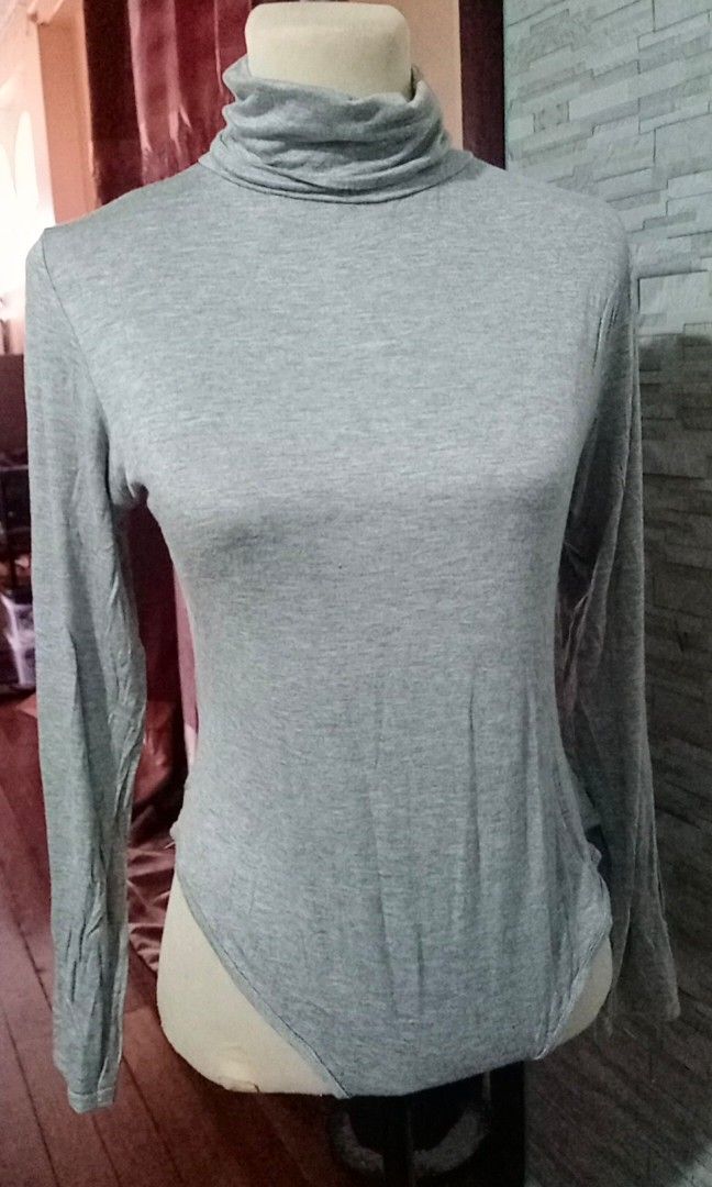 Gray Turtle neck Bodysuit (Category: Longsleeves) located in Makati City. Submitted by decluttering_stuff101 (Listing ID 1362754570, Image 2). Description: excellent condition stretchable.