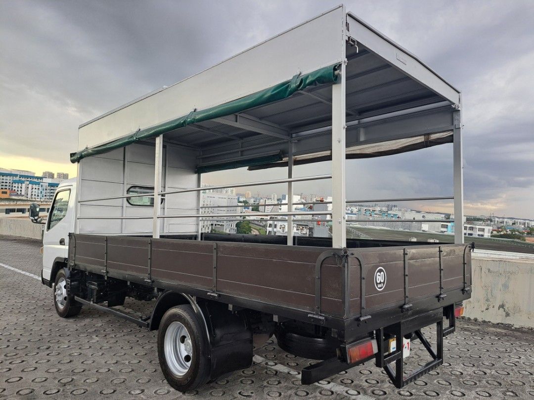 Mitsubishi Fuso Canter FEB71 (Category: Used Commercial Vehicles for Sale) located in Singapore. Submitted by ezy-1 (Listing ID 1362710505, Image 2). Description: 🔥Mitsubishi FEB71 14FT 🔥 ✅️ONE OWNER ✅️GOOD CONDITION ✅️CLASS 3 LICENSE ✅️NEW PAINTWORK ✅️100% LOAN ✅️SLIDING CANOPY ✅️CARRY UP TO 4.2 TON ✅️HIGH TRADE IN 🍍🍍🍍🍍🍍🍍🍍🍍🍍🍍🍍🍍 ☎️CALL ME CY NOW COME VIEWING AND TEST DRIVE. 🎊🎊🎊🎊 ☎️85568225 Cykho ☎️85568225 Cykho ☎️85568225 Cykho