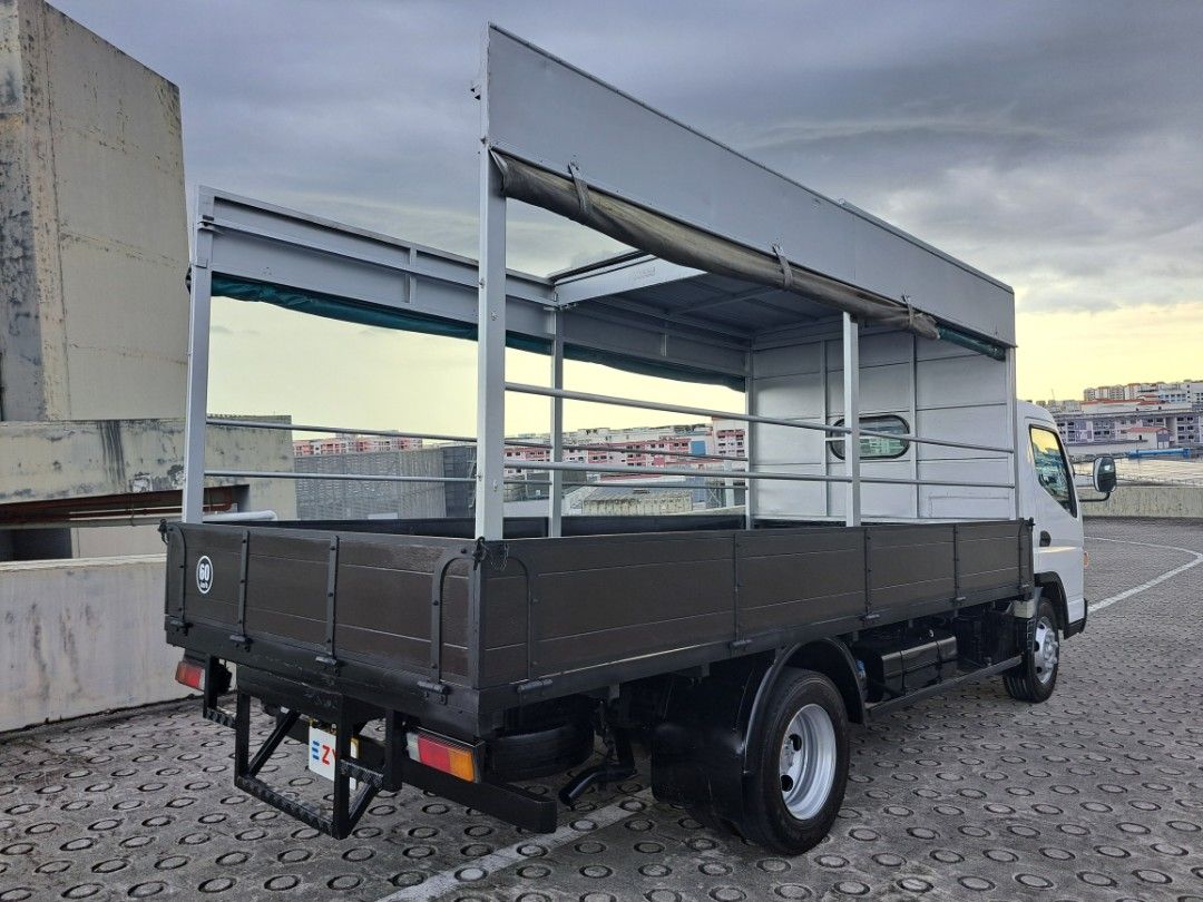 Mitsubishi Fuso Canter FEB71 (Category: Used Commercial Vehicles for Sale) located in Singapore. Submitted by ezy-1 (Listing ID 1362710505, Image 3). Description: 🔥Mitsubishi FEB71 14FT 🔥 ✅️ONE OWNER ✅️GOOD CONDITION ✅️CLASS 3 LICENSE ✅️NEW PAINTWORK ✅️100% LOAN ✅️SLIDING CANOPY ✅️CARRY UP TO 4.2 TON ✅️HIGH TRADE IN 🍍🍍🍍🍍🍍🍍🍍🍍🍍🍍🍍🍍 ☎️CALL ME CY NOW COME VIEWING AND TEST DRIVE. 🎊🎊🎊🎊 ☎️85568225 Cykho ☎️85568225 Cykho ☎️85568225 Cykho