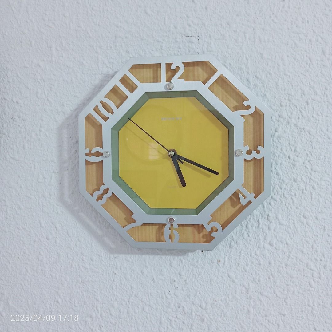 Octagon shaped wall clock 30cm wide