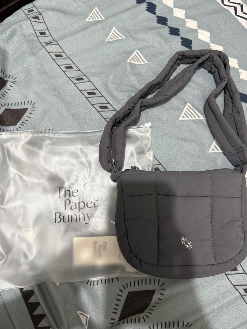 Paper Bunny Mini Puffer Swing in Shadow (Category: Shoulder Bags) located in Quezon City. Submitted by pattyeval (Listing ID 1362707680, Image 1). Description: Paper Bunny Mini Puffer Swing in Shadow Only used once, still in good condition Can fit iphone 16 pro max or any model in pro max Bought for 2.5k, fixed na po yung price RFS: Declutter.