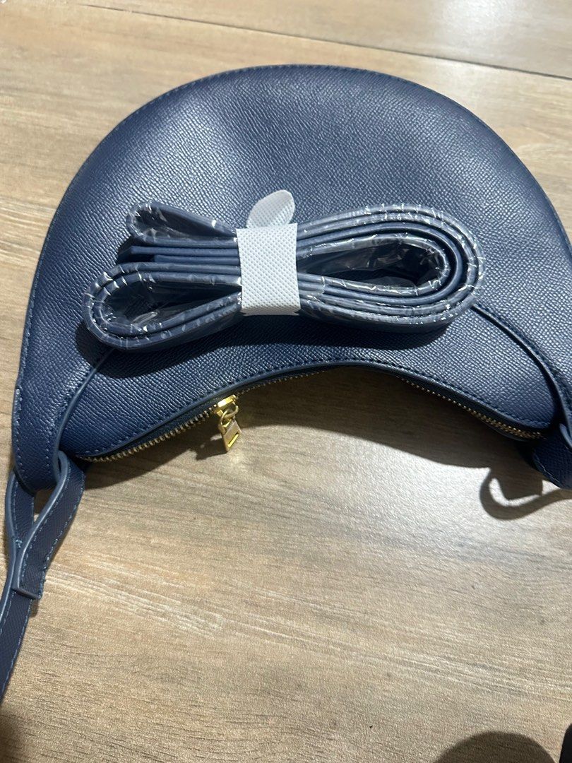 Polene Numero Dix Inspired Moon Structured Bag (Category: Cross-body Bags) located in Pasig City. Submitted by mendd (Listing ID 1246435368, Image 2). Description: with 1 short and 1 long strap with minimal signs of usage.