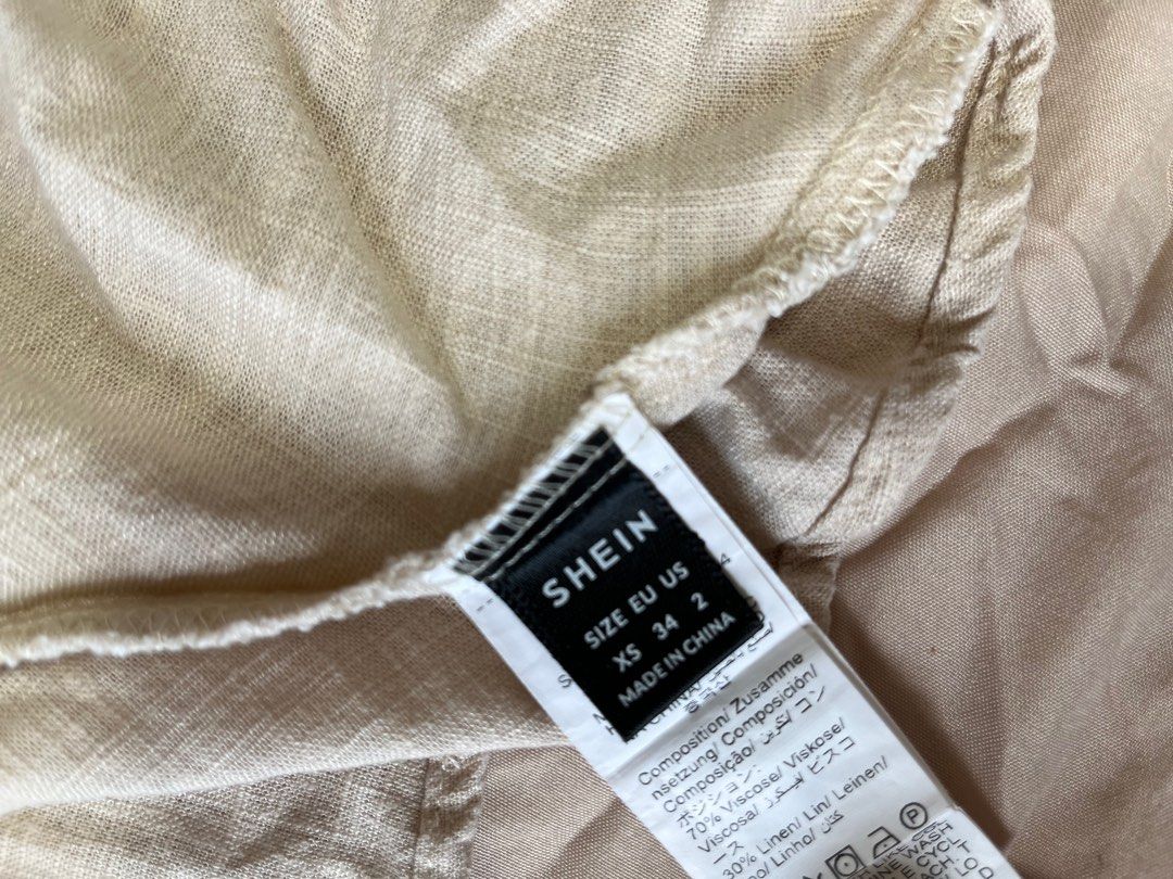 Shein linen sleeveless top (Category: Sleeveless) located in Makati City. Submitted by isso2 (Listing ID 1362684305, Image 2). Description: Very cute in actual Great quality Double-lined in breast area as seen in pic 4.