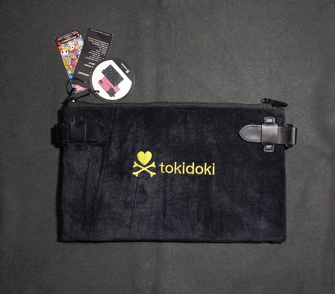 Tokidoki 2 face clutch bag (Category: Luxury Bags & Wallets) located in Cadiz. Submitted by comradstuff (Listing ID 1362715036, Image 2). Description: Tokidoki 2 face clutch bag brand new.